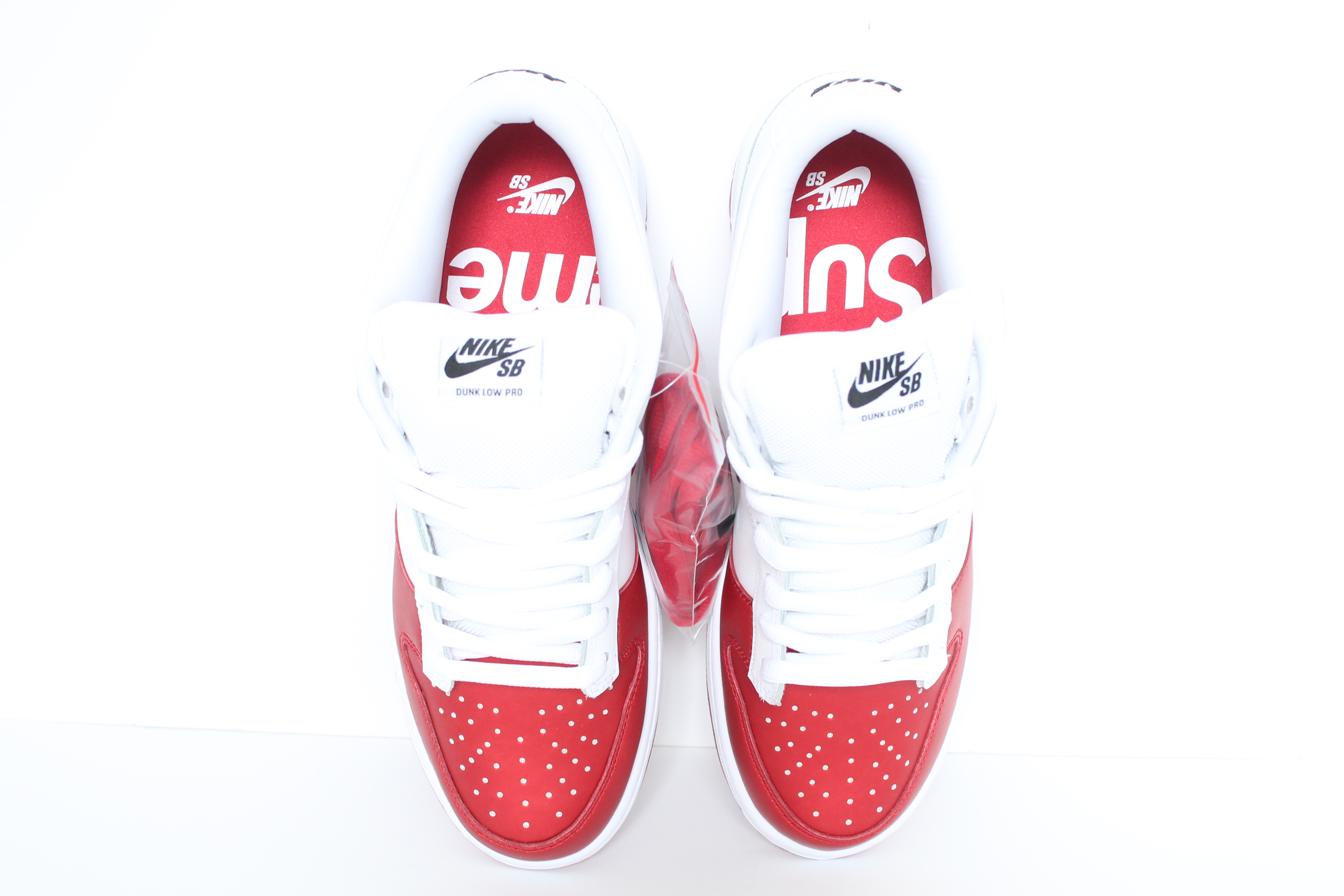 supreme nike white shoes