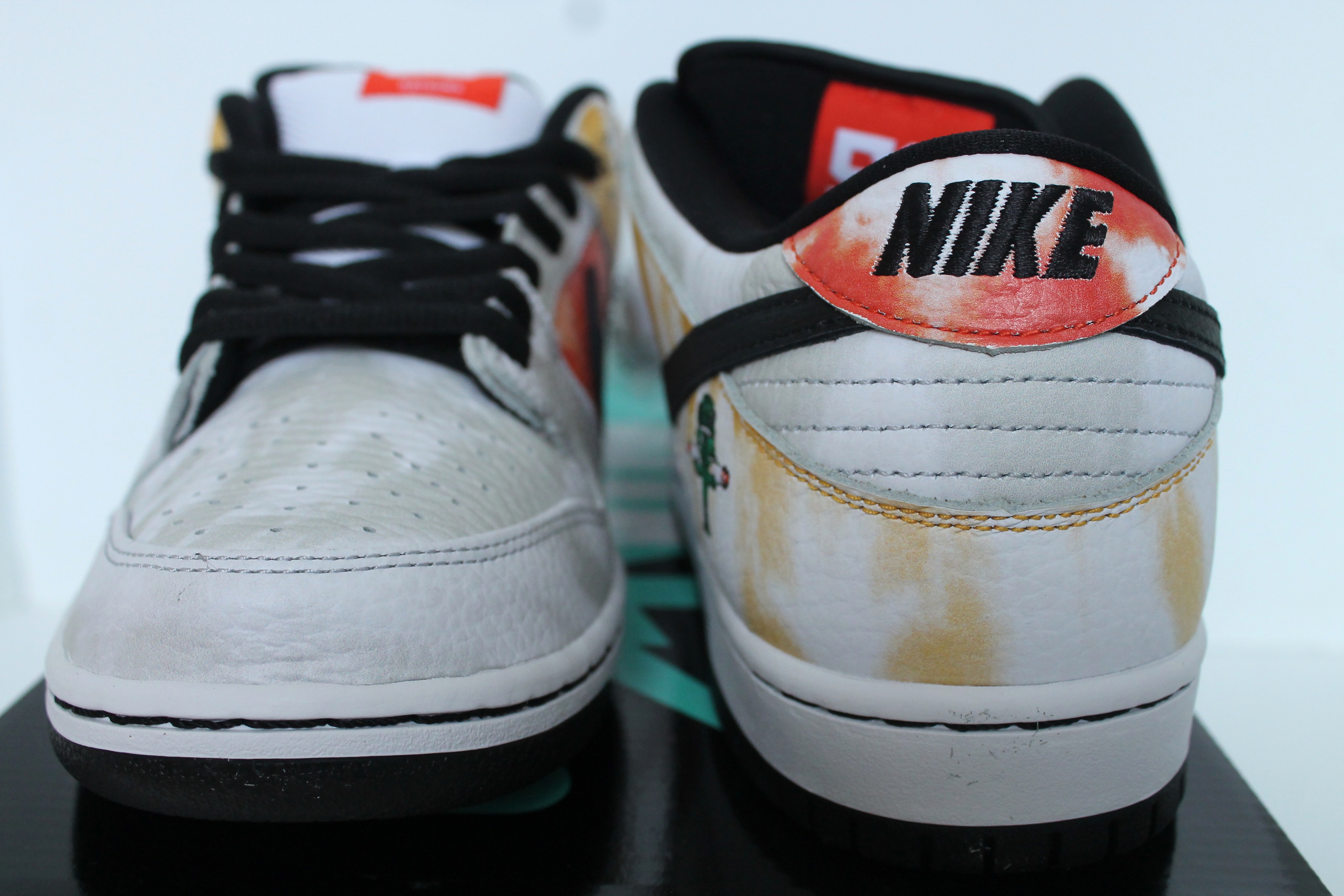 nike sb dunk low raygun white